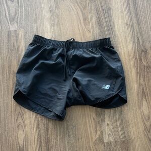 New balance, black shorts